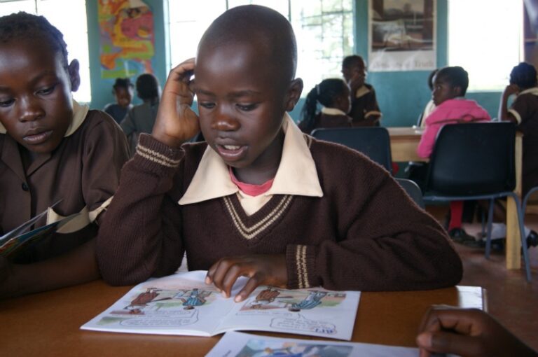 child reading in classroom